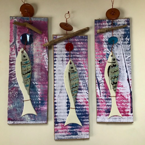 1 fish, wire, driftwood, different colour buttons: £12 each 1 fish, wire, driftwood, different colour buttons: £12 each
